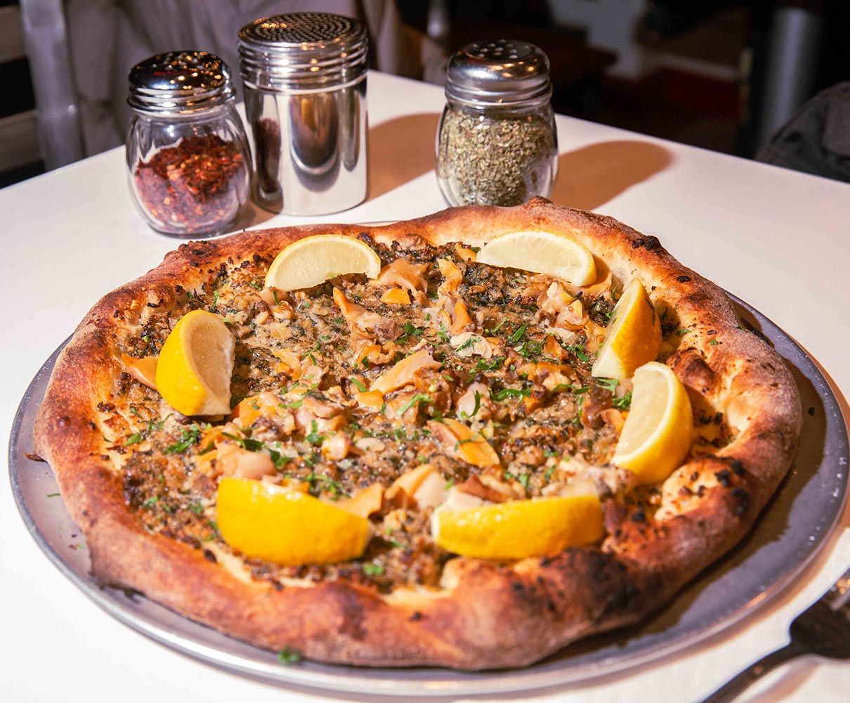 Bellucci Pizza on table